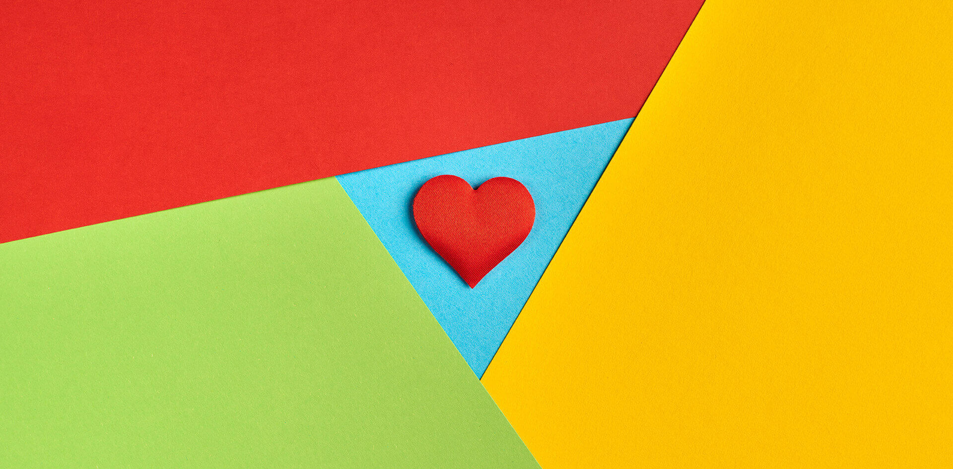 Heart made from a piece of red paper