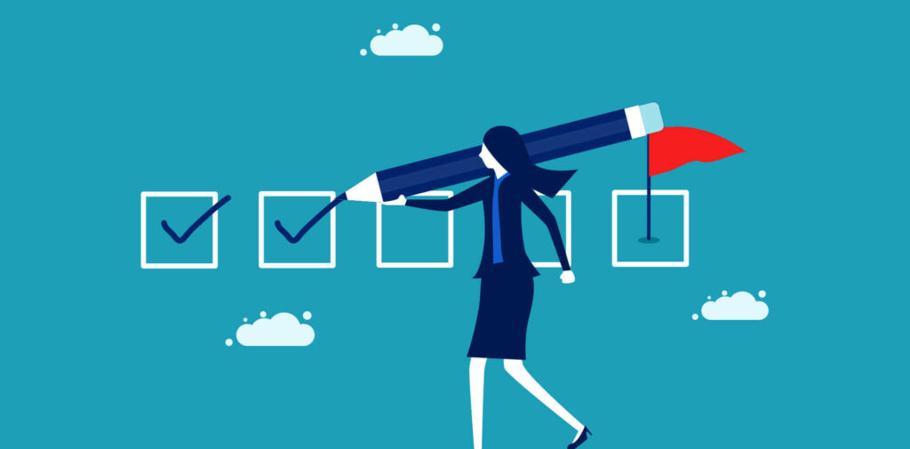 A woman holding a giant pencil in her hand