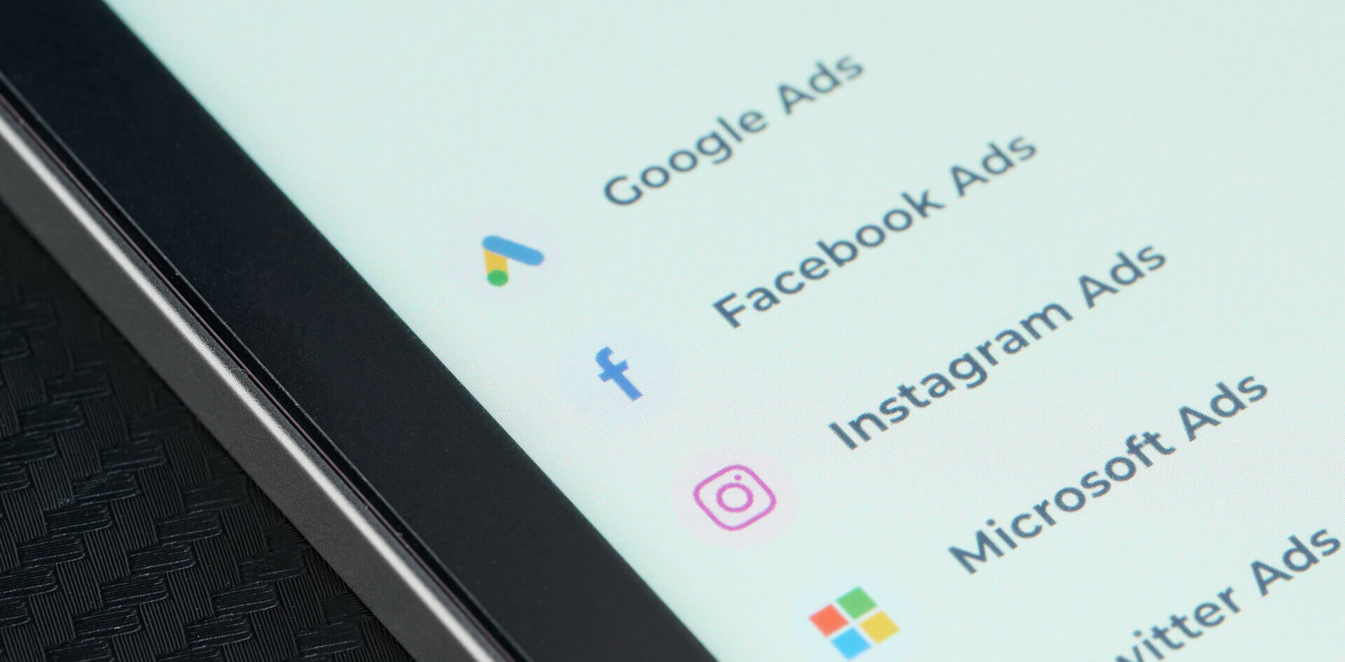 Screen displaying app icons and text for popular advertising platforms including Google Ads, Facebook Ads, Instagram Ads, Microsoft Ads & Twitter Ads